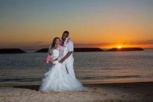 Hawaii beach wedding at sunset